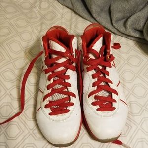 Red and white Nike basketball shoes